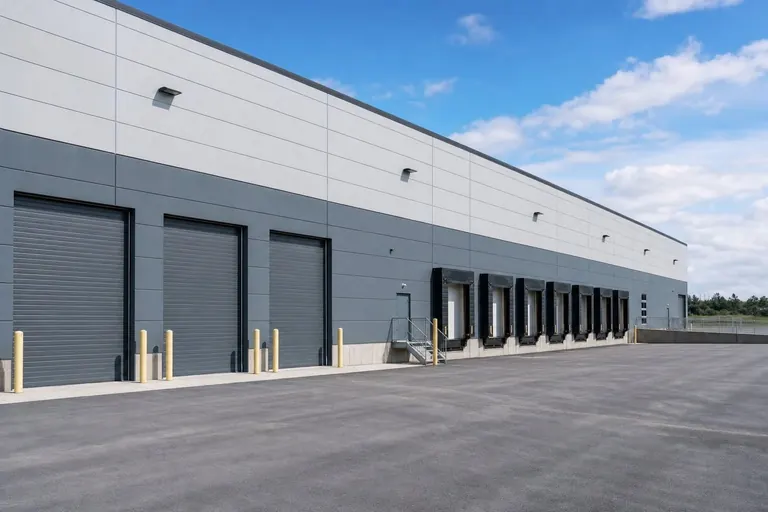 Commercial garage doors on a warehouse loading dock